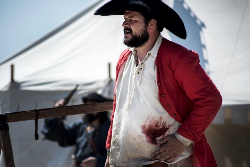 Wounded red coat